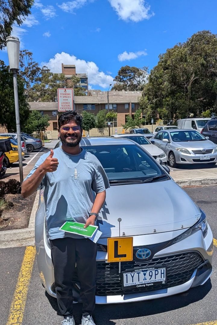 Student holds VicRoads pass certificate