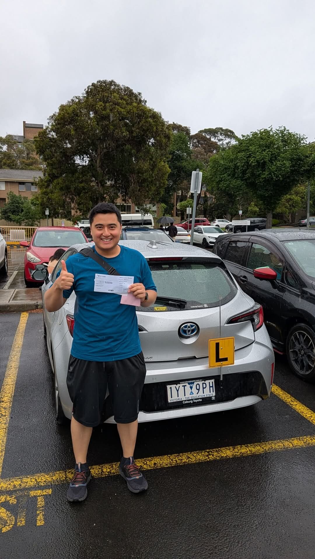 Student celebrating VicRoads pass certificate