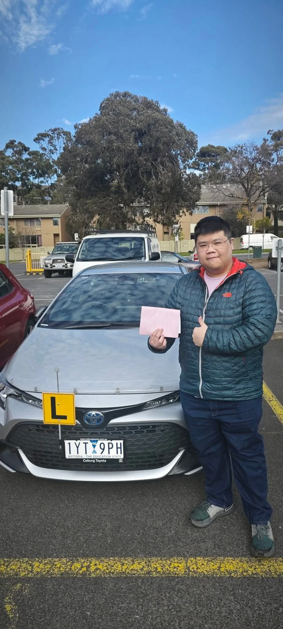 Student celebrating passing VicRoads driving test