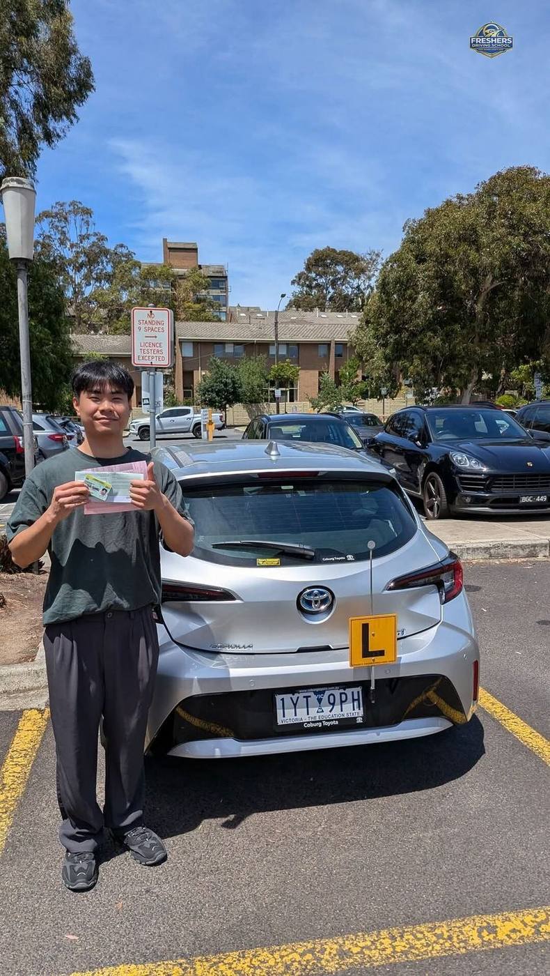 Student celebrates passing VicRoads driving test with Freshers Driving School Melbourne